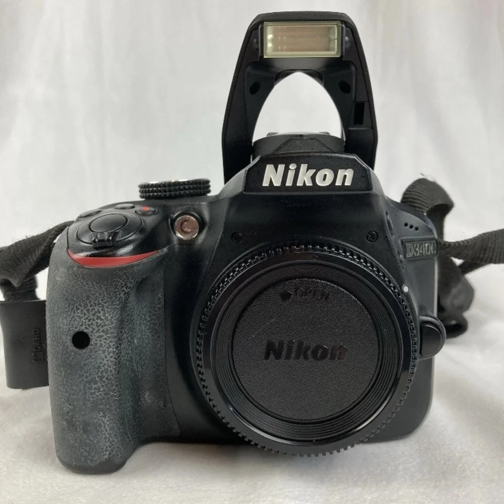 Nikon D3400 DSLR Camera w/ 18-55 Lens, SD, Strap, Battery, Charger (7.3K Shots)